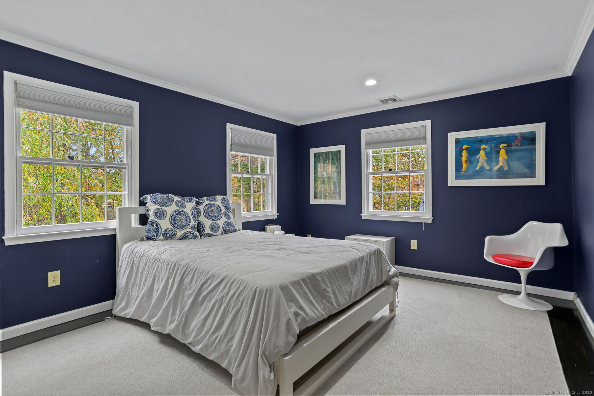 31 White Birch Road Weston, CT 06883 - Photo 24 of 37 a bedroom with a bed and window