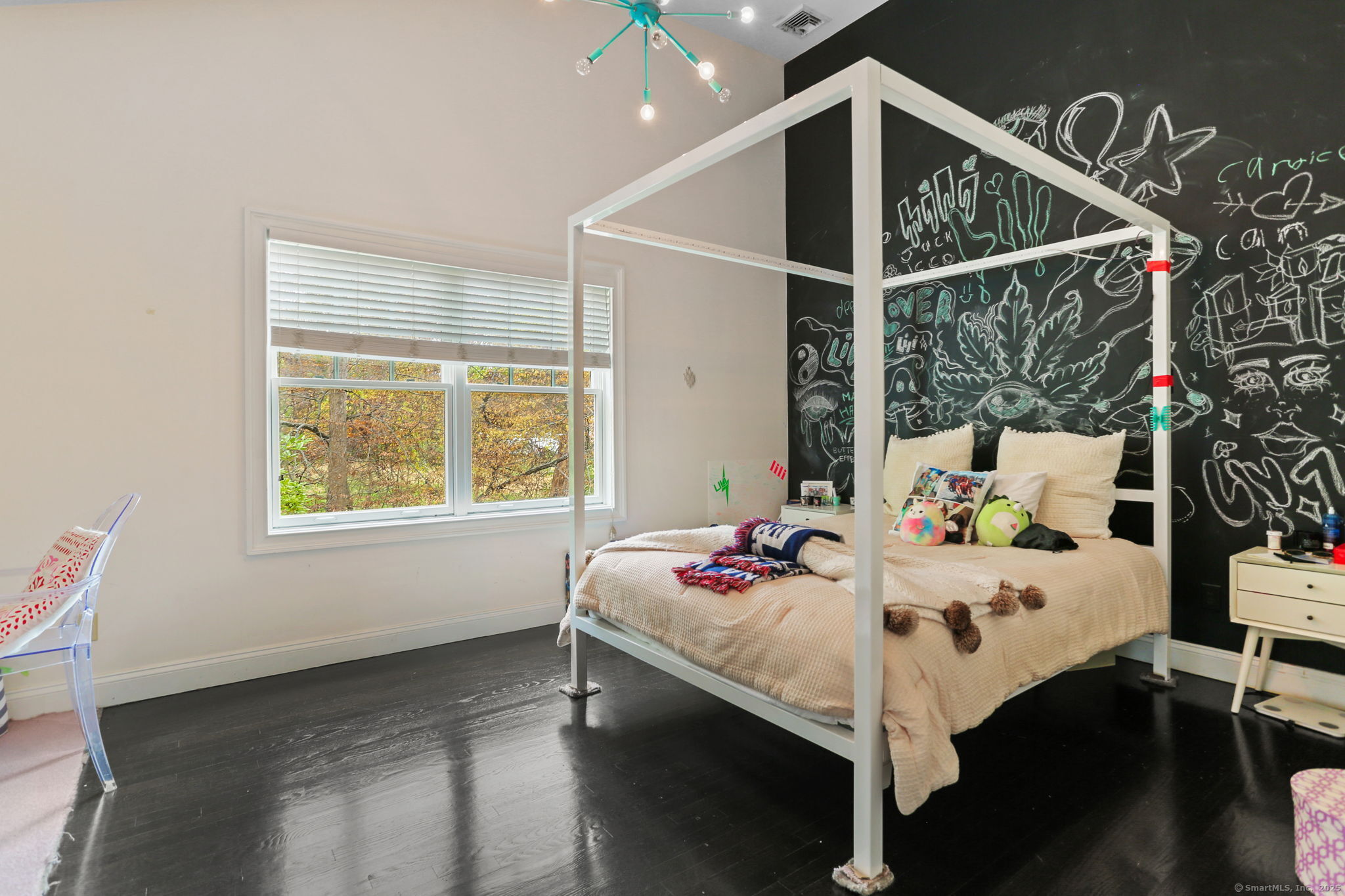 31 White Birch Road Weston, CT 06883 - Photo 26 of 37 a bedroom with a bed and large window