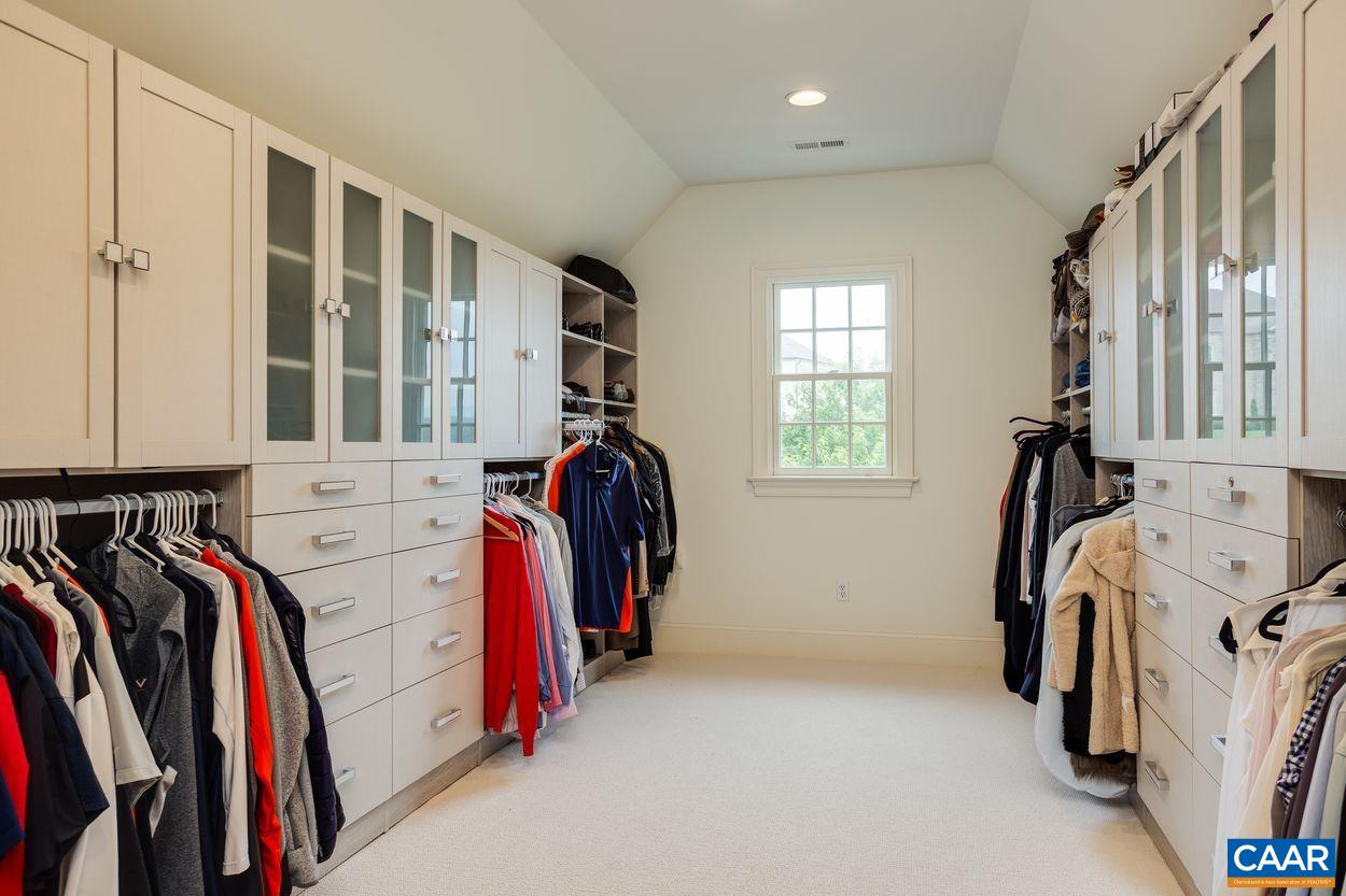 585 Ragged Mountain Drive Charlottesville, VA 22903 - Photo 33 of 60 a view of walk in closet with clothes and shoes