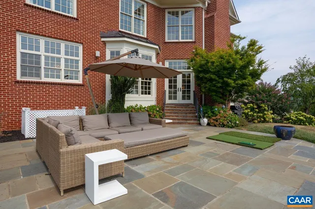 an aerial view of a house with a garden