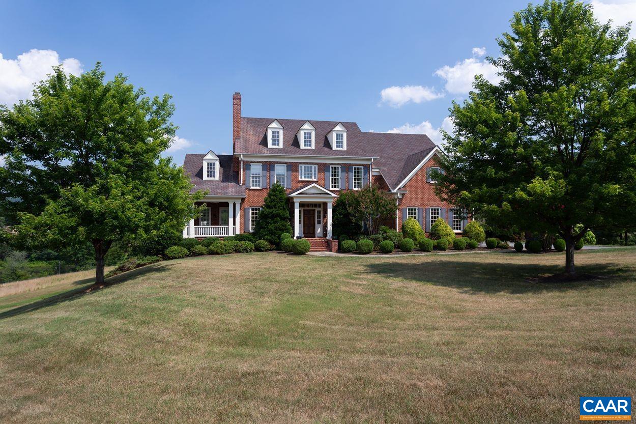 585 Ragged Mountain Drive Charlottesville, VA 22903 - Photo 46 of 60 a front view of a house with a yard and trees