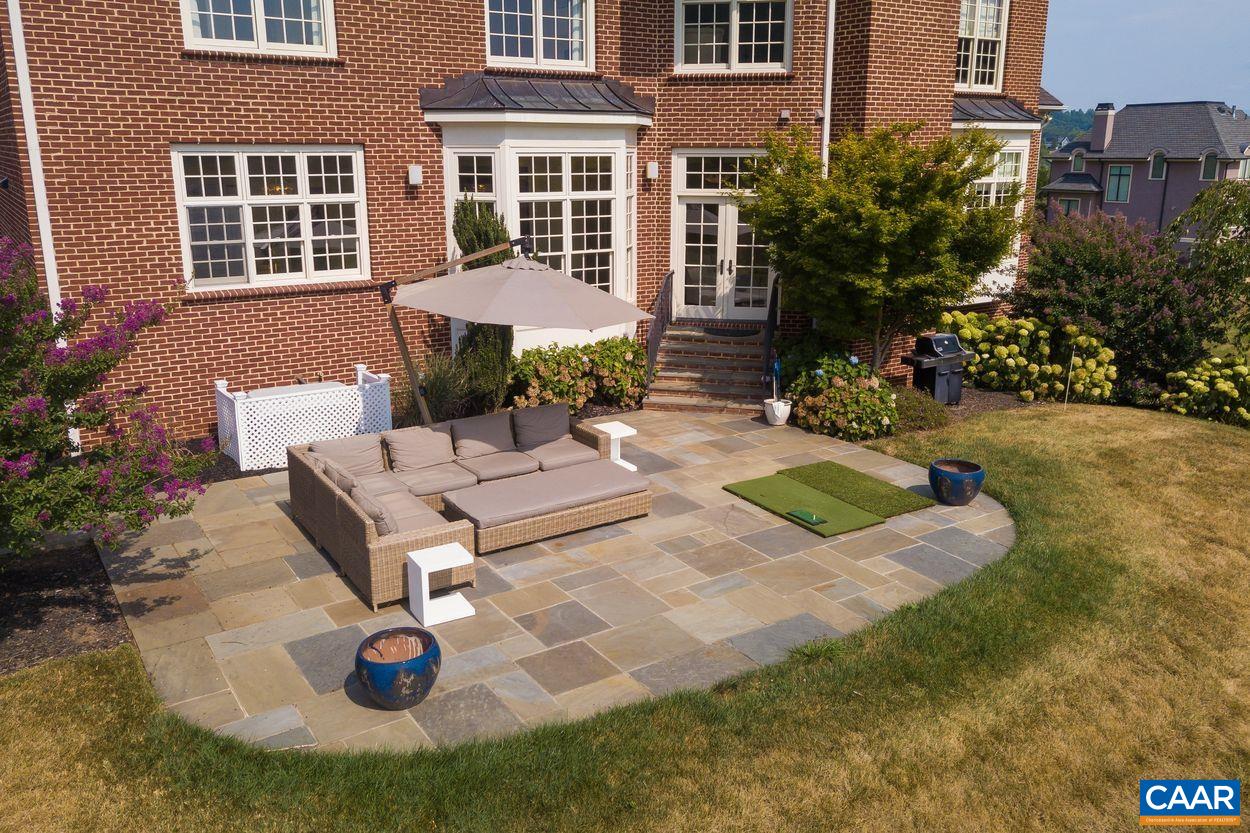 585 Ragged Mountain Drive Charlottesville, VA 22903 - Photo 59 of 60 a view of a house with backyard porch and sitting area