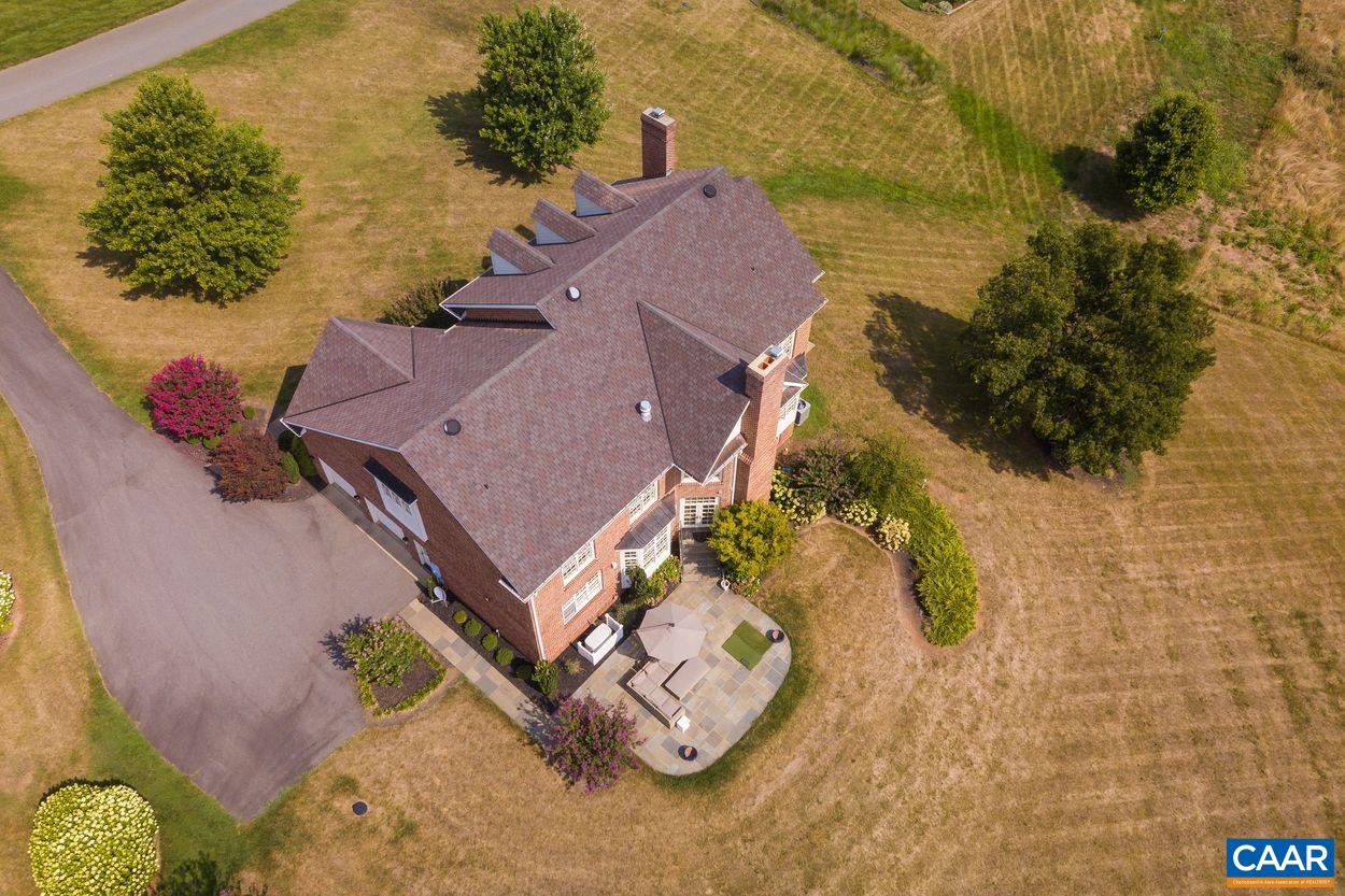 585 Ragged Mountain Drive Charlottesville, VA 22903 - Photo 60 of 60 an aerial view of a house with a yard and ocean view