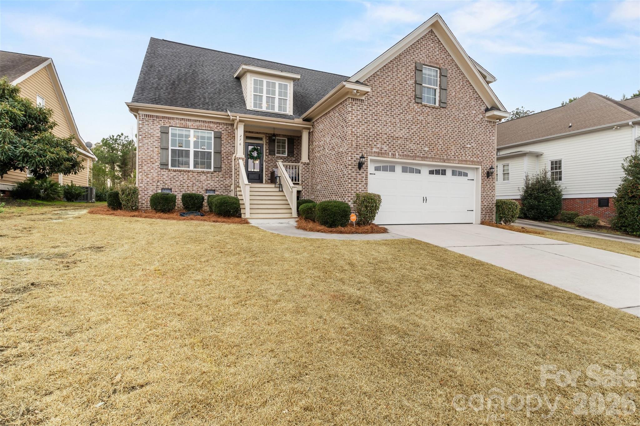 276 Belle Ridge Road Elgin, SC 29045 - Photo 2 of 45 a front view of a house with a yard