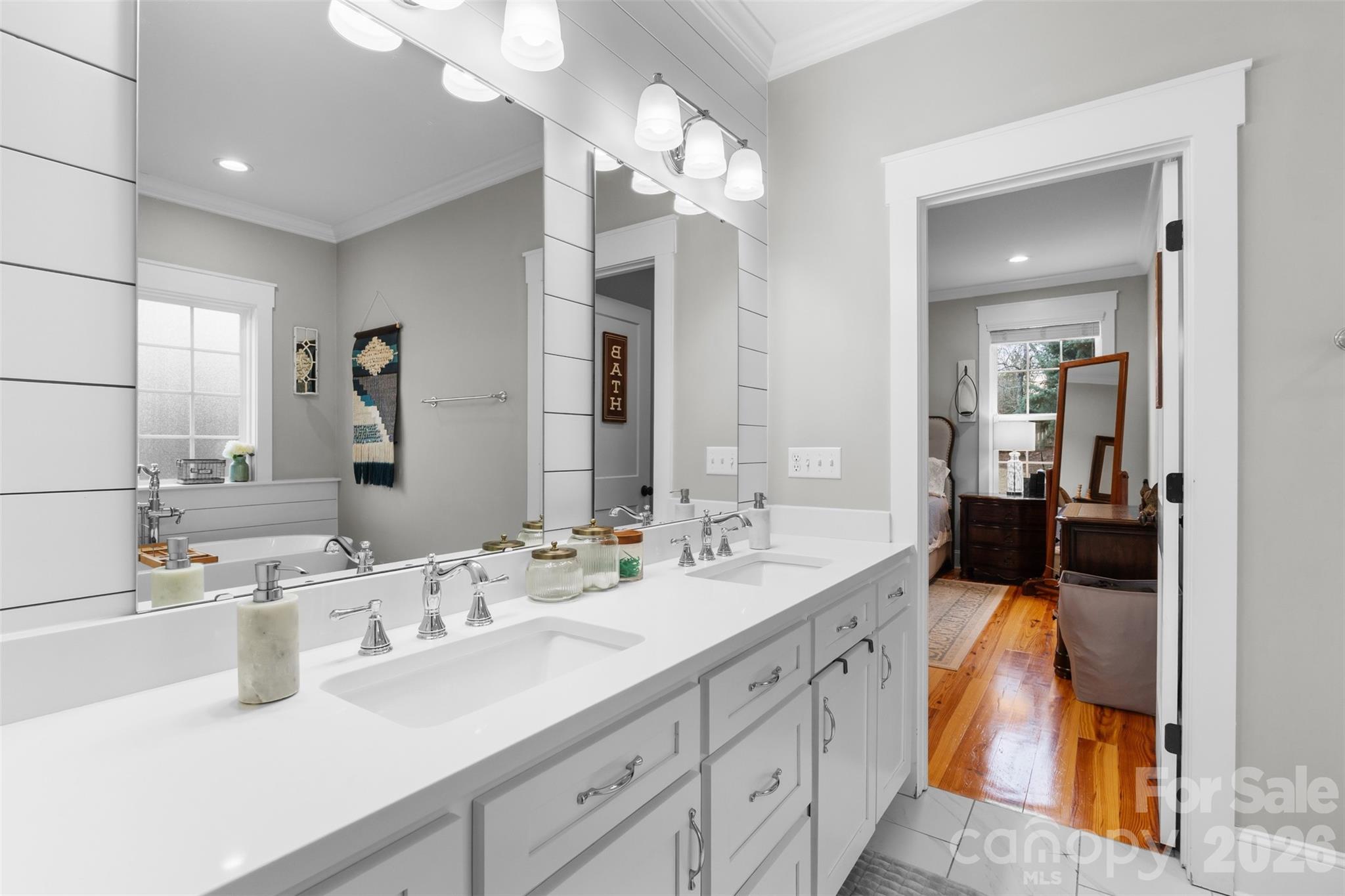276 Belle Ridge Road Elgin, SC 29045 - Photo 22 of 45 a en suite bathroom with double sink and a mirror