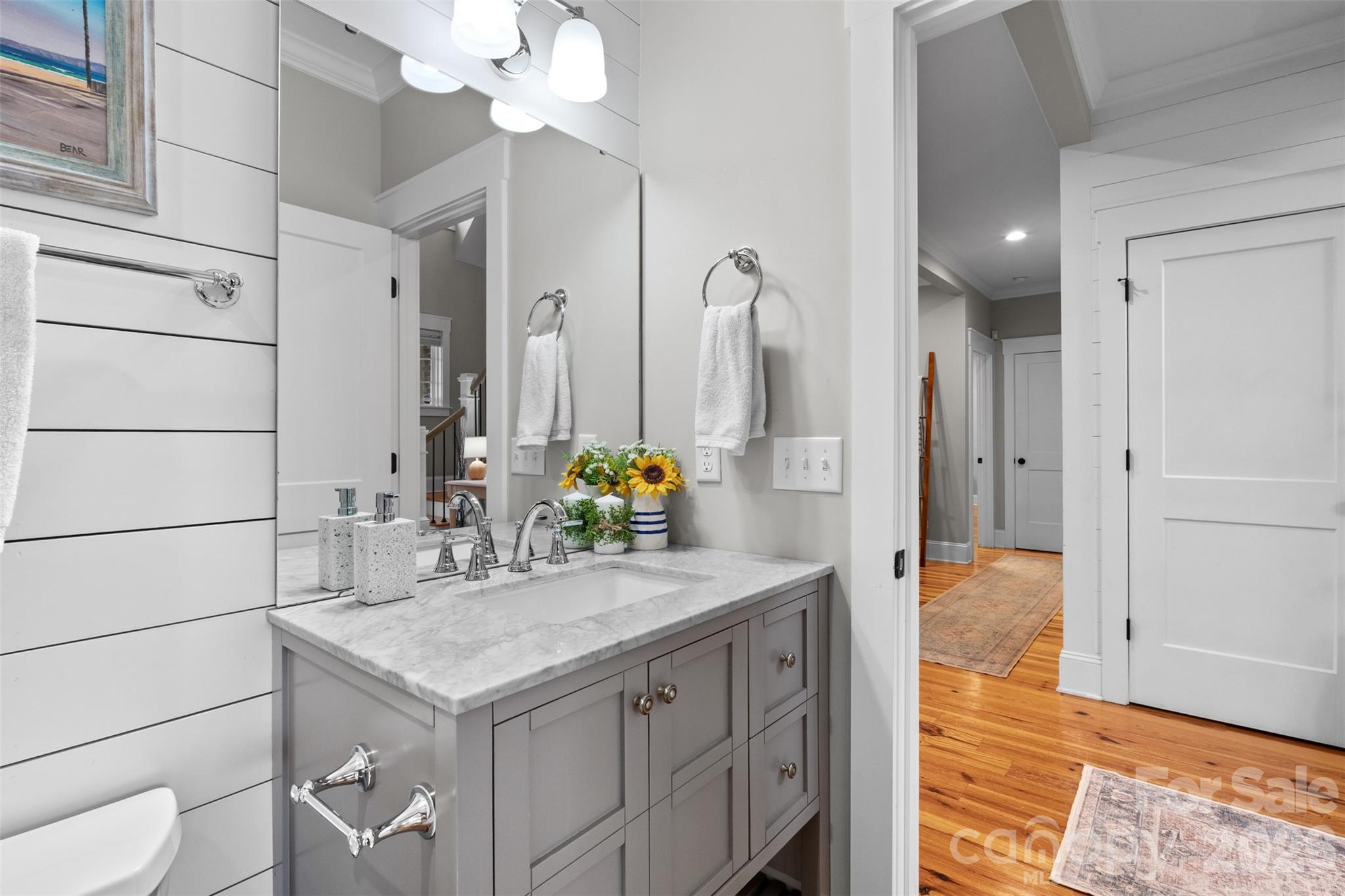 276 Belle Ridge Road Elgin, SC 29045 - Photo 23 of 45 a bathroom with a sink a vanity and a mirror