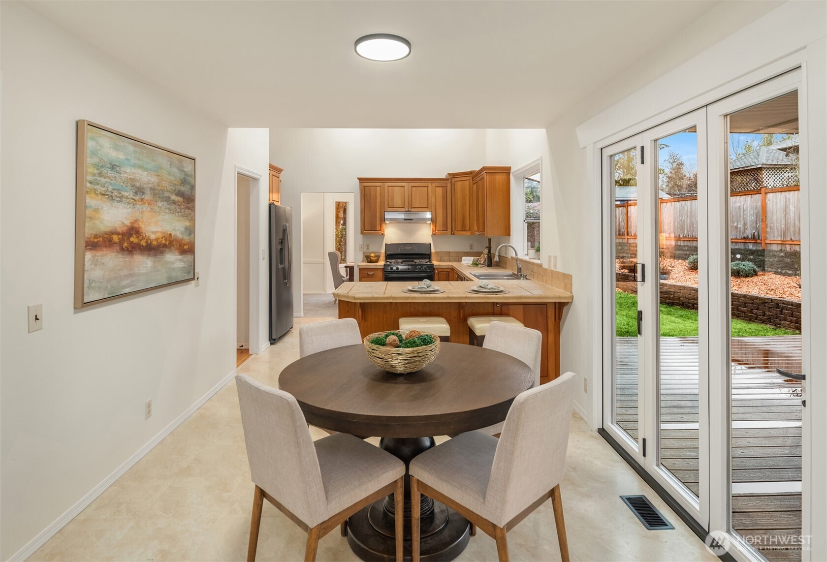 1425 243rd Place Southwest Bothell, WA 98021 - Photo 11 of 39 a dining room with furniture and window