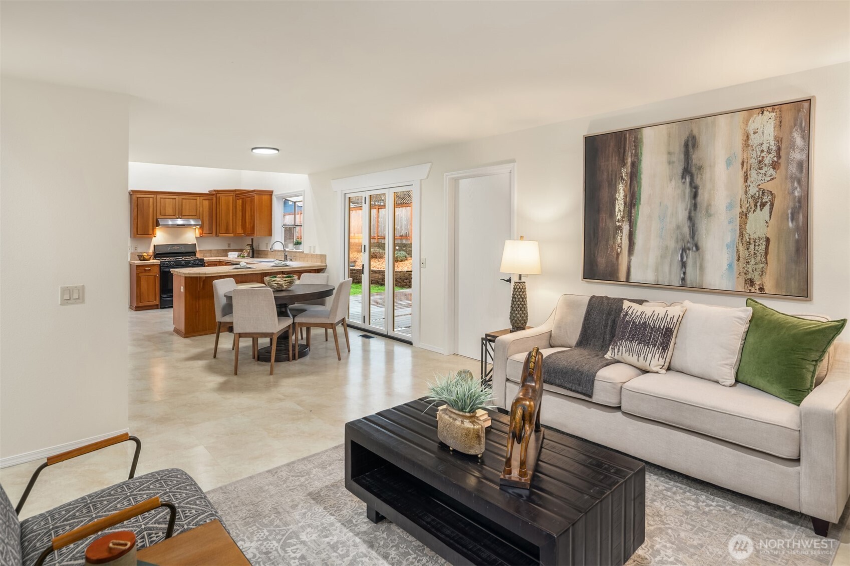 1425 243rd Place Southwest Bothell, WA 98021 - Photo 13 of 39 a living room with furniture and a large window