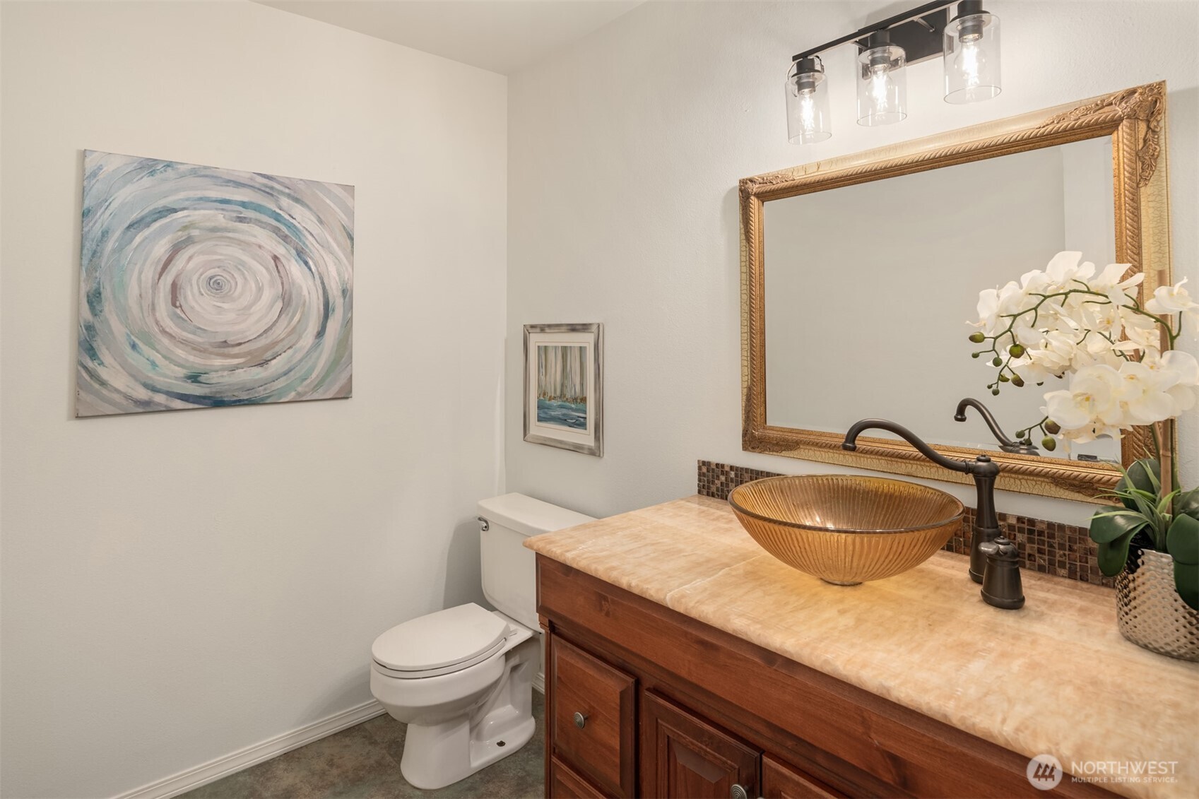 1425 243rd Place Southwest Bothell, WA 98021 - Photo 15 of 39 a bathroom with a granite countertop toilet sink and mirror