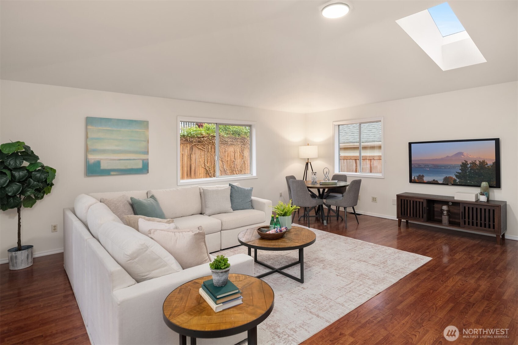 1425 243rd Place Southwest Bothell, WA 98021 - Photo 16 of 39 a living room with furniture and a flat screen tv