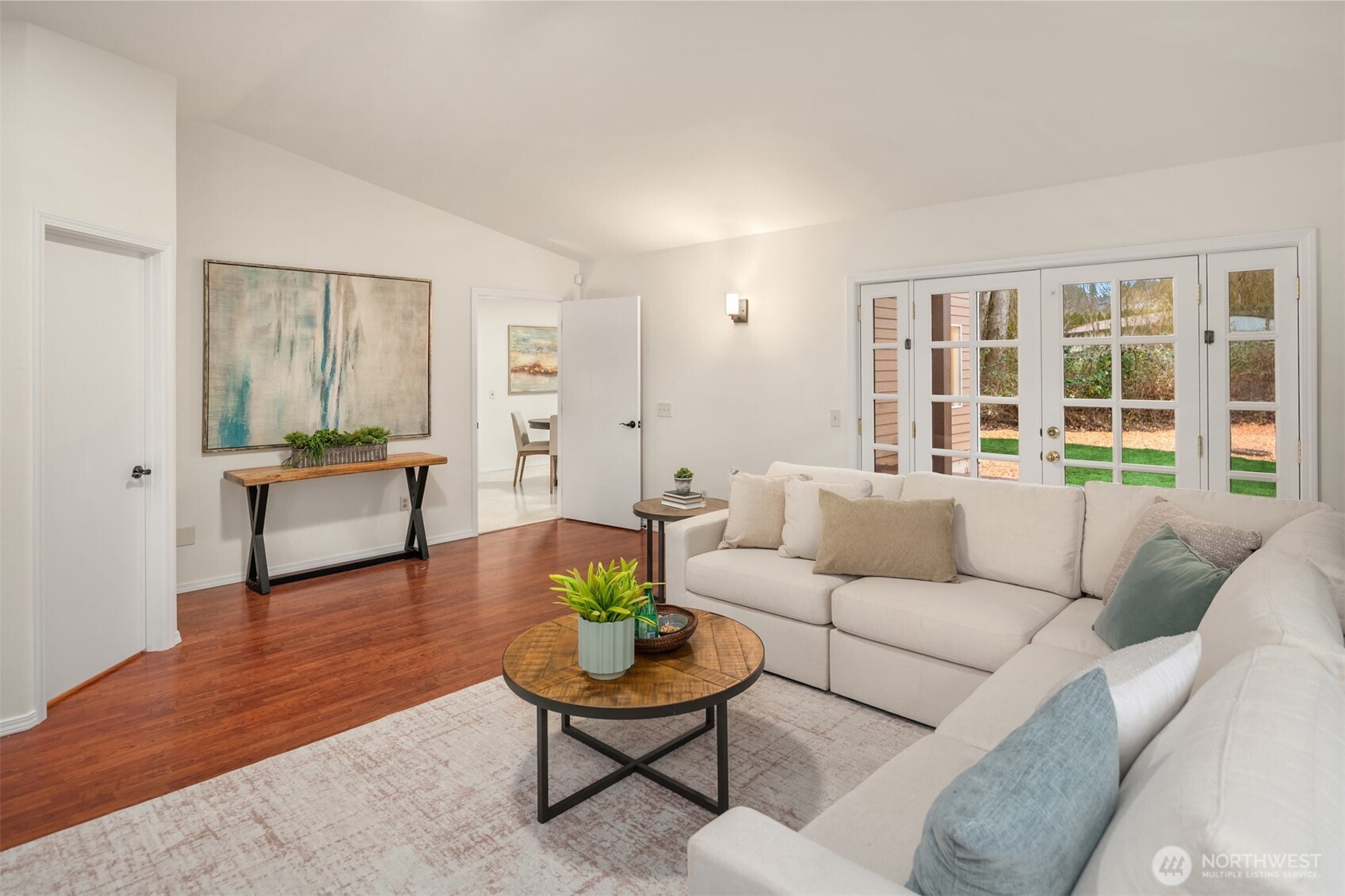 1425 243rd Place Southwest Bothell, WA 98021 - Photo 17 of 39 a living room with furniture and a large window