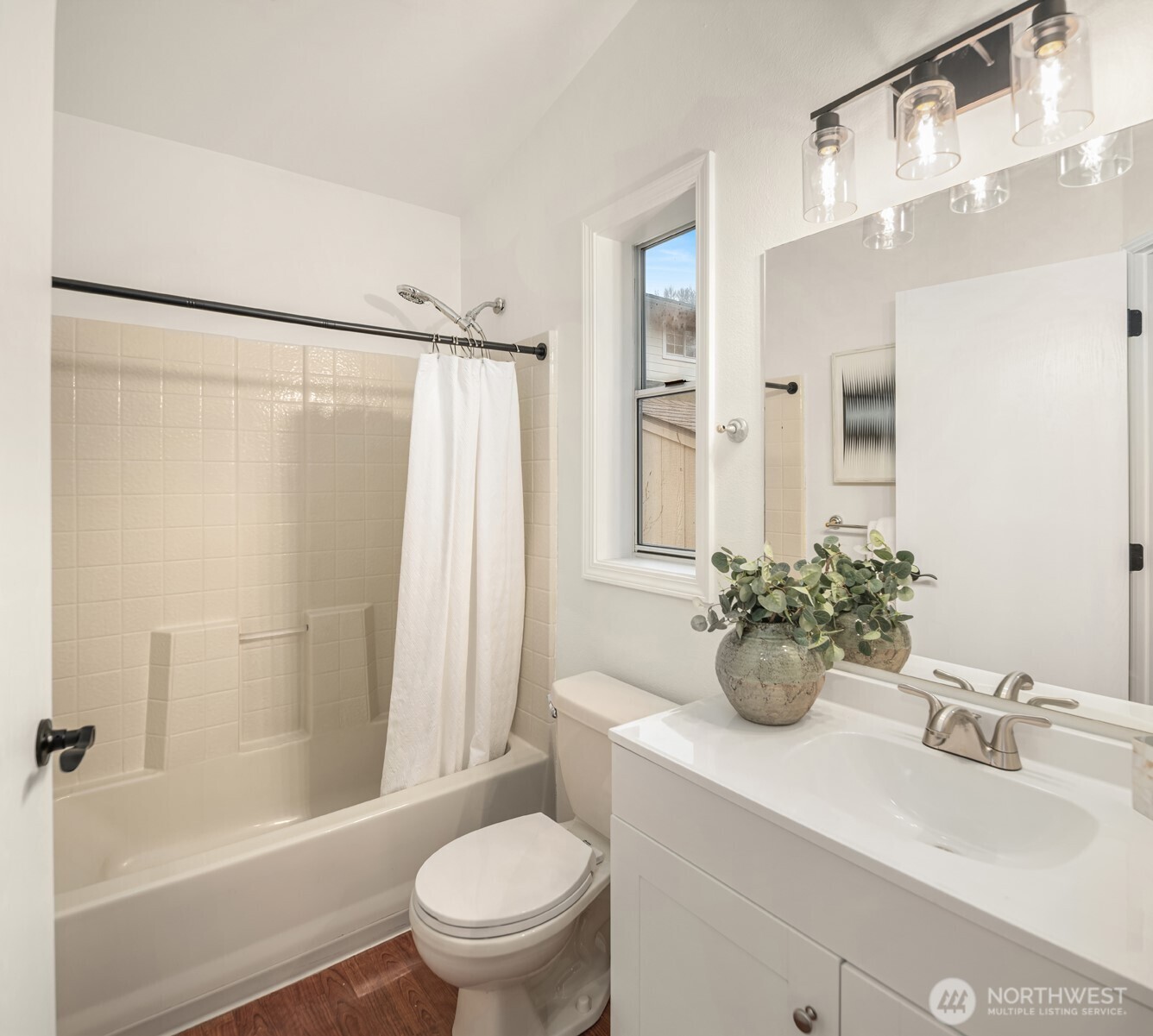 1425 243rd Place Southwest Bothell, WA 98021 - Photo 18 of 39 a bathroom with a sink toilet and shower