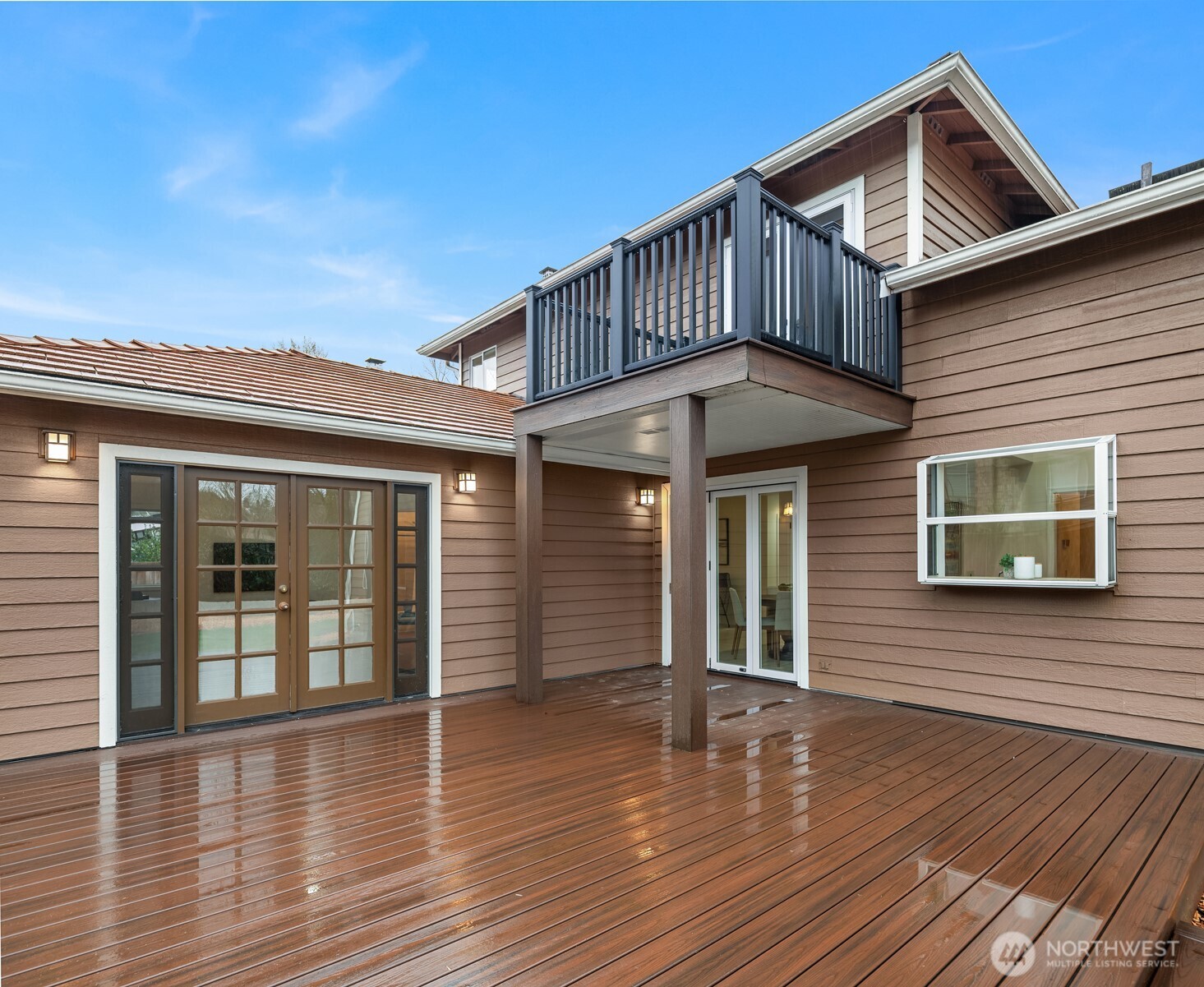 1425 243rd Place Southwest Bothell, WA 98021 - Photo 19 of 39 a view of a house with wooden deck