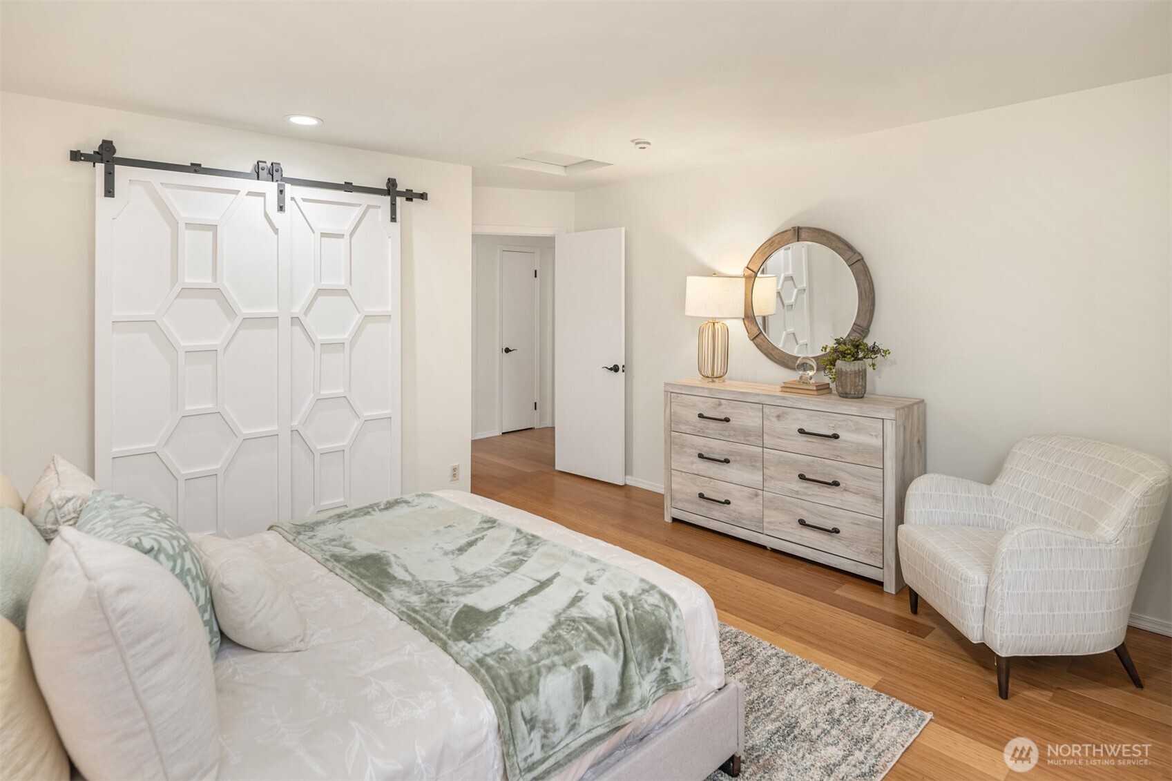 1425 243rd Place Southwest Bothell, WA 98021 - Photo 20 of 39 a bedroom with a bed and a couch