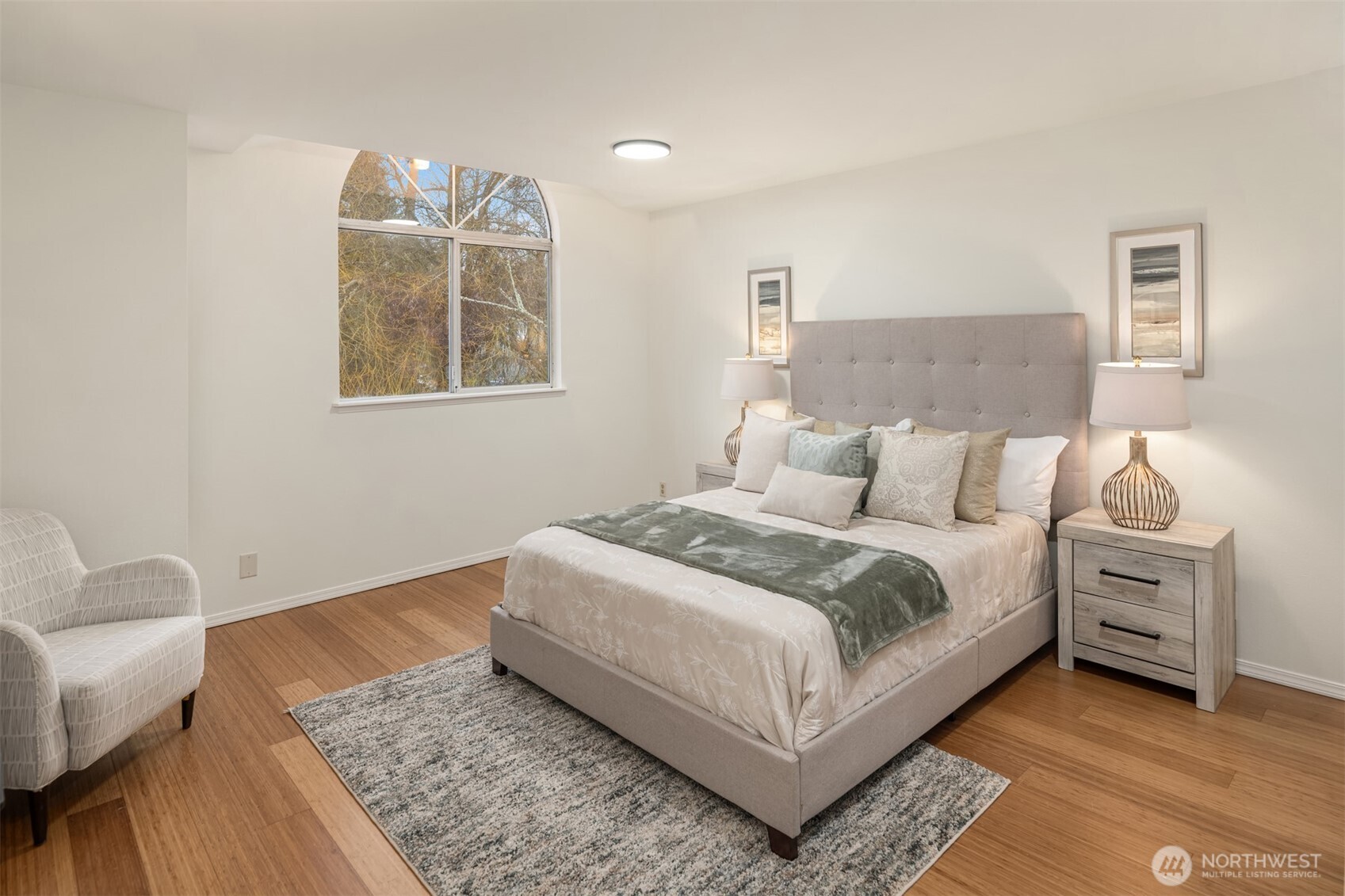 1425 243rd Place Southwest Bothell, WA 98021 - Photo 21 of 39 a bedroom with a bed and a couch