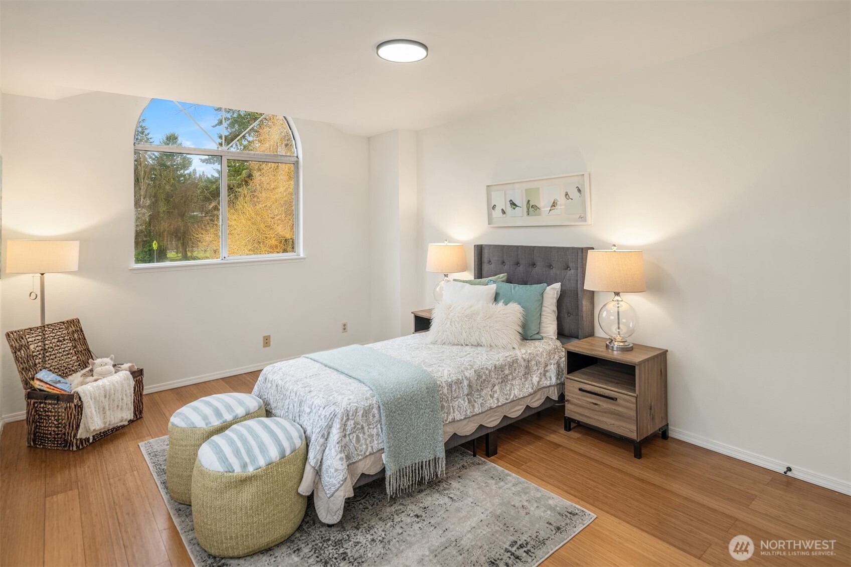 1425 243rd Place Southwest Bothell, WA 98021 - Photo 22 of 39 a bedroom with a bed and a couch