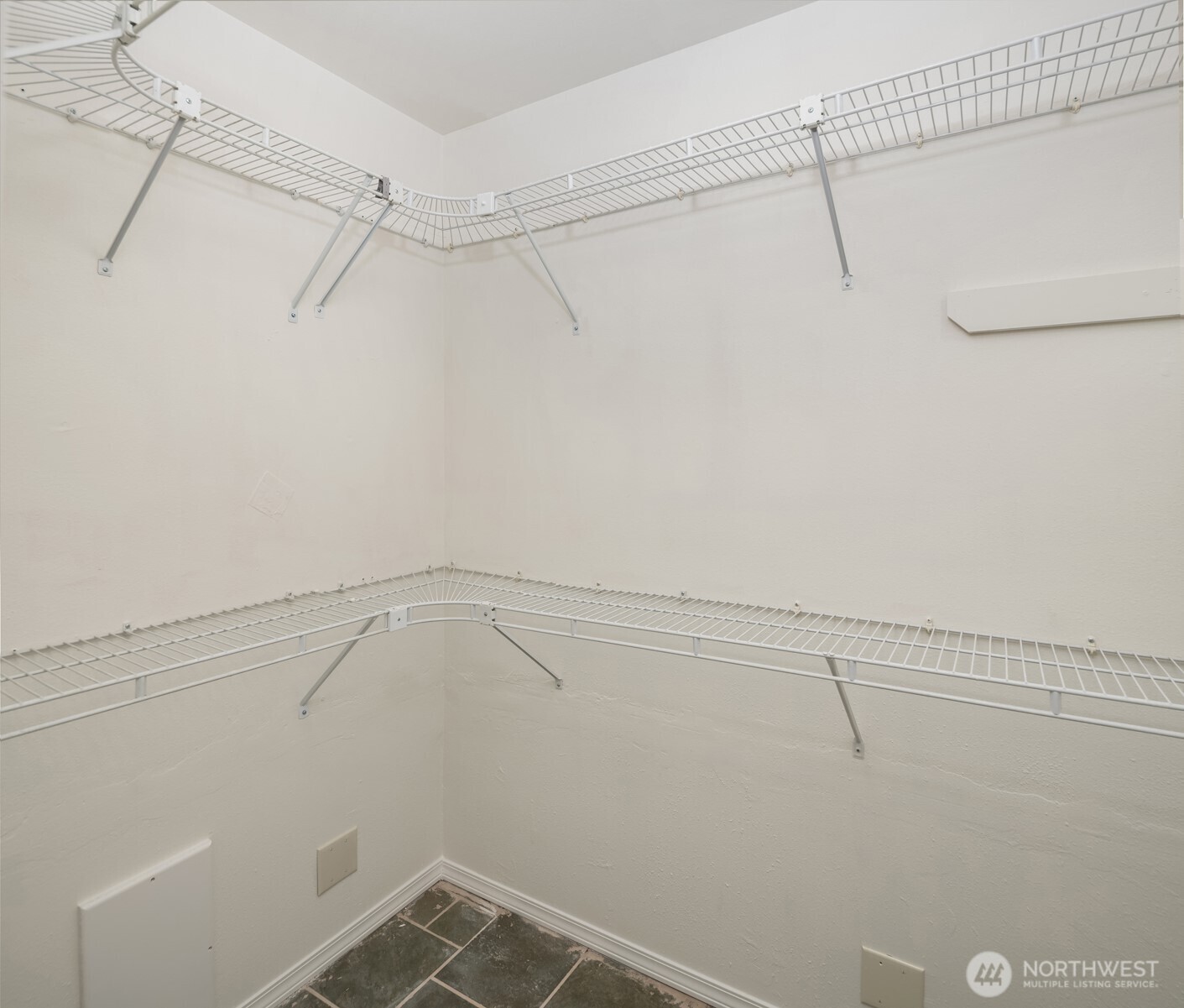 1425 243rd Place Southwest Bothell, WA 98021 - Photo 27 of 39 a view of a room with racks on the wall