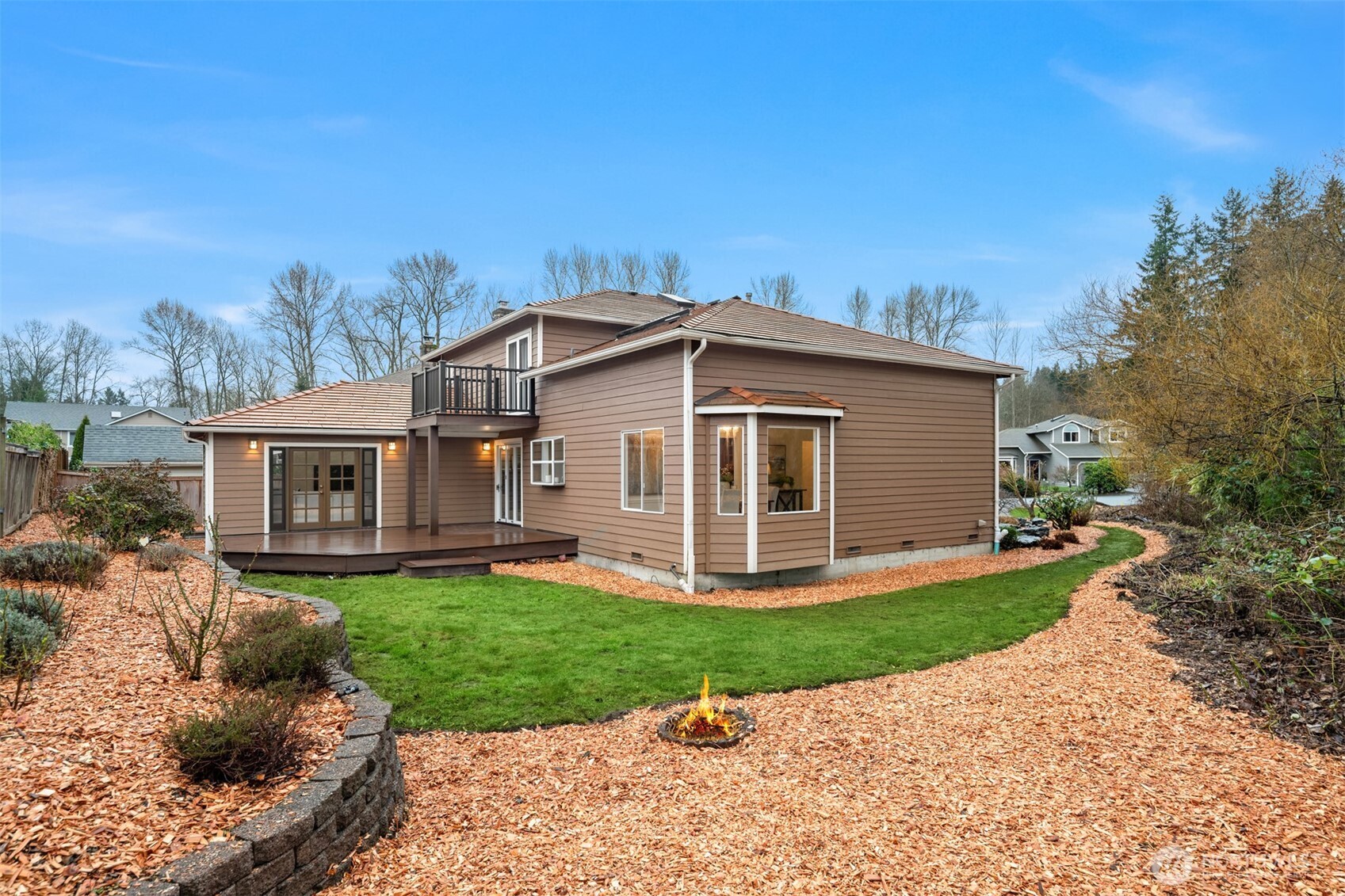 1425 243rd Place Southwest Bothell, WA 98021 - Photo 30 of 39 a view of a house with a yard and sitting area