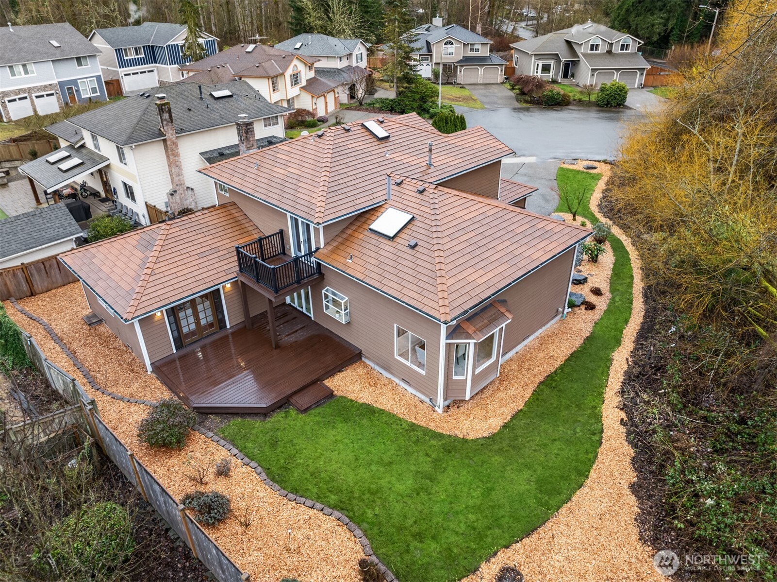 1425 243rd Place Southwest Bothell, WA 98021 - Photo 31 of 39 a aerial view of a house with swimming pool and sitting area