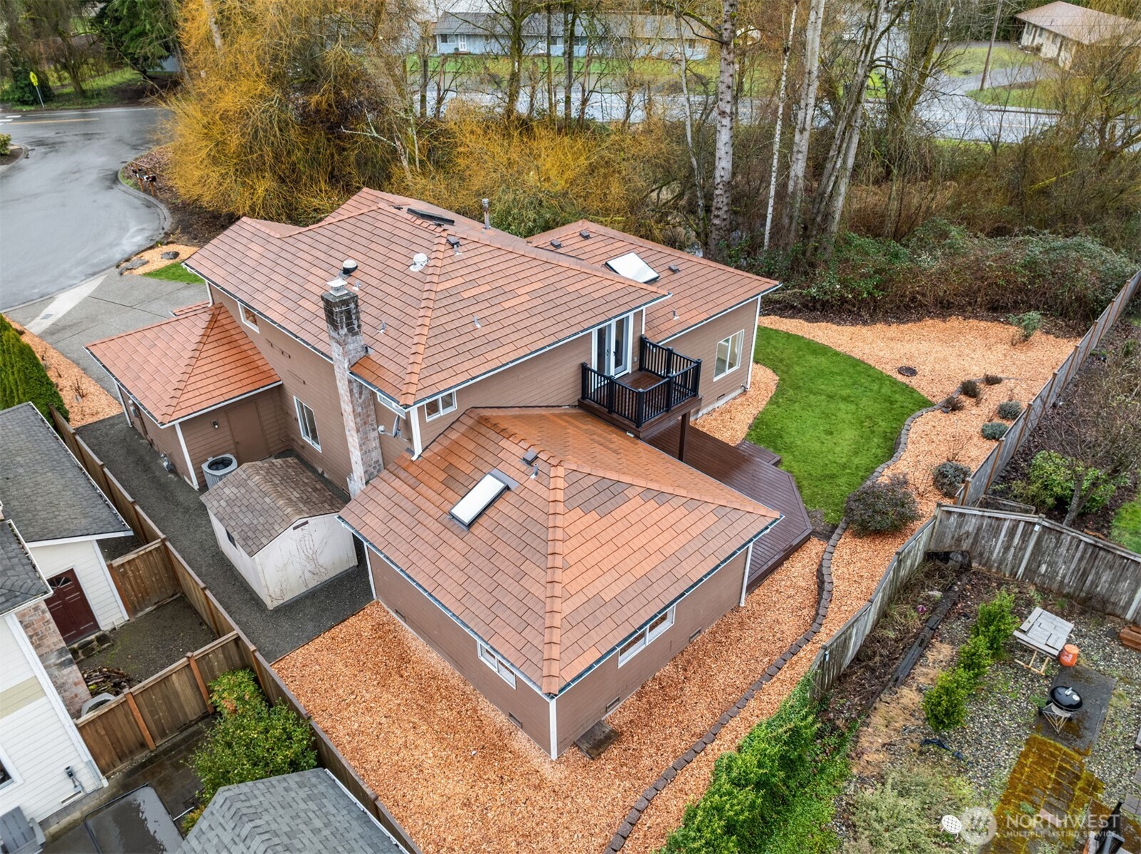 1425 243rd Place Southwest Bothell, WA 98021 - Photo 32 of 39 an aerial view of a house with a yard