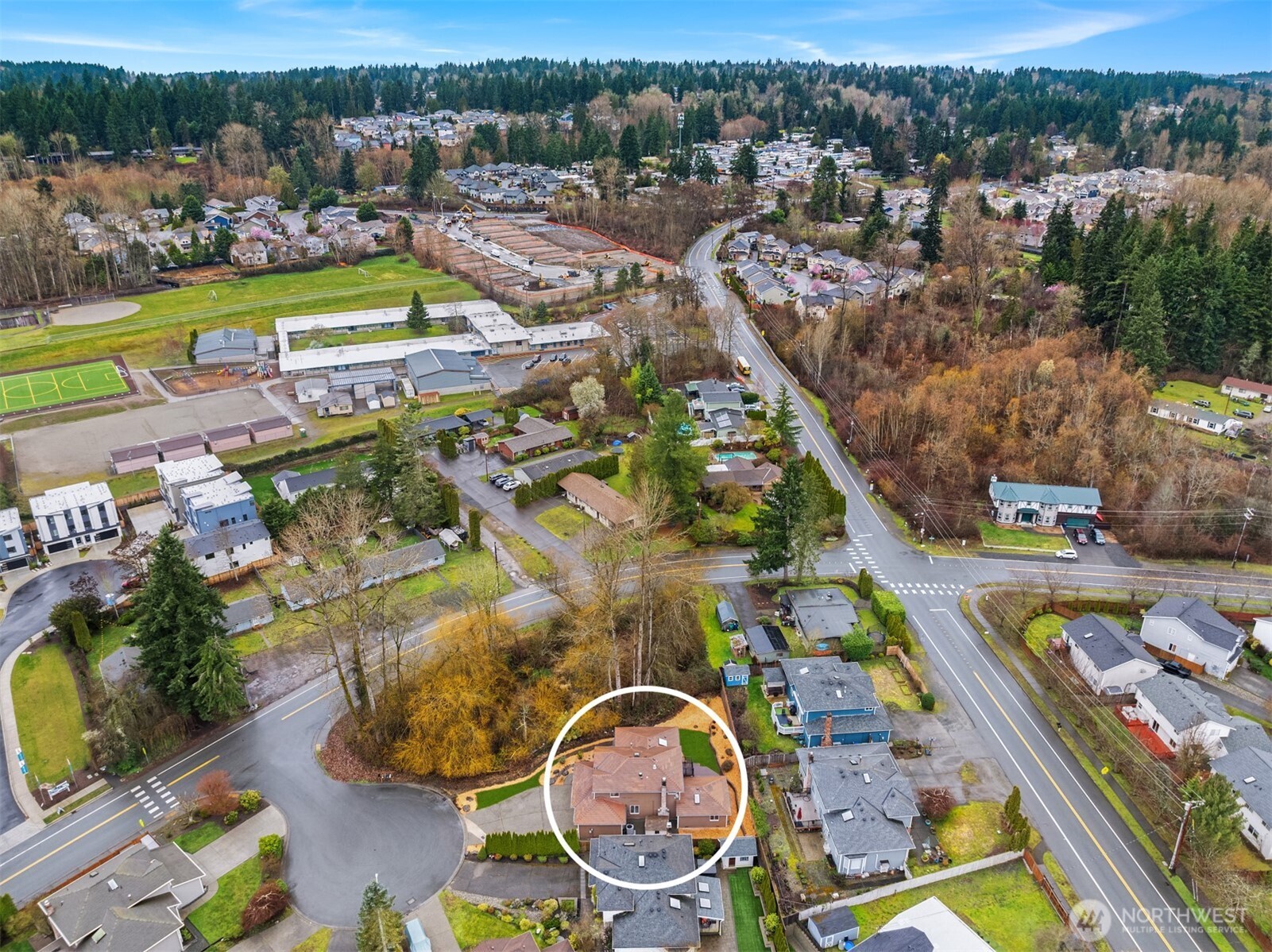 1425 243rd Place Southwest Bothell, WA 98021 - Photo 37 of 39 an aerial view of a house with a swimming pool