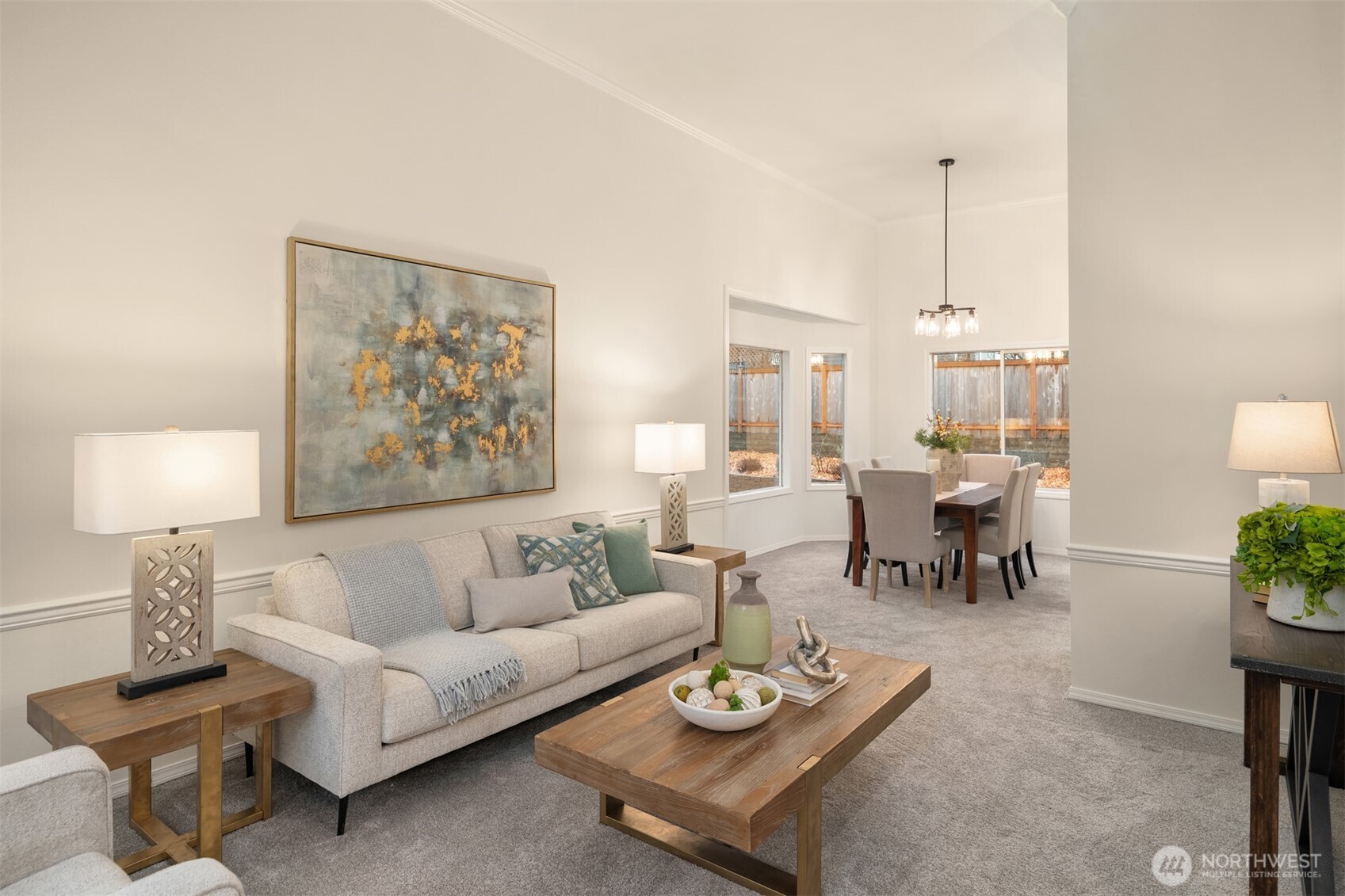 1425 243rd Place Southwest Bothell, WA 98021 - Photo 4 of 39 a living room with furniture and a lamp