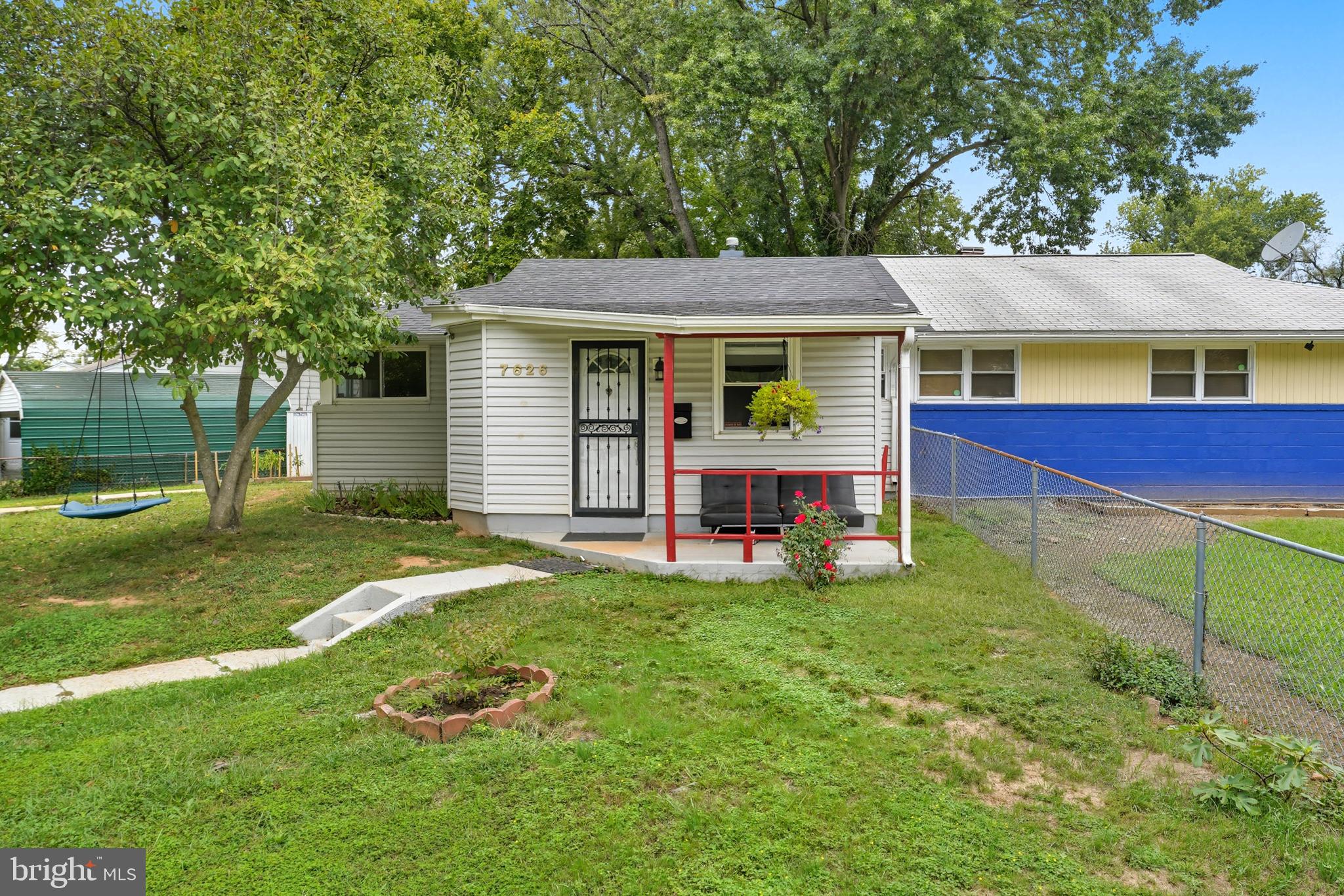 7626 Greenleaf Road Landover, MD 20785 - Photo 1 of 24 a view of a house with a yard porch and sitting area