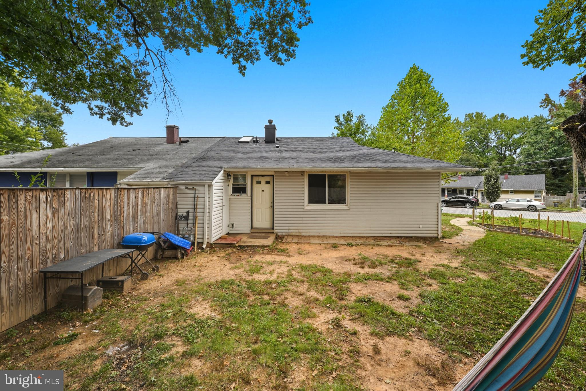 7626 Greenleaf Road Landover, MD 20785 - Photo 20 of 24 a front view of a house with garden