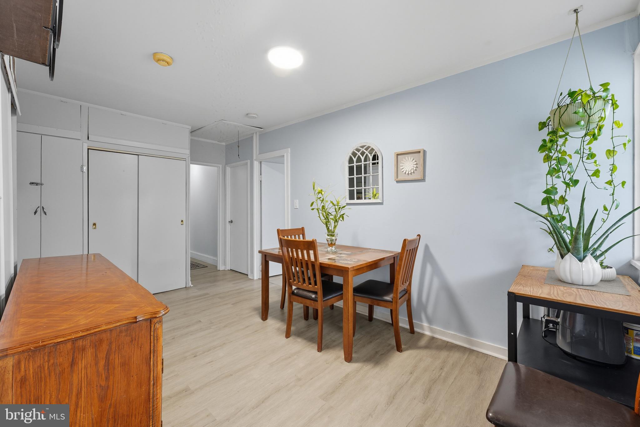 7626 Greenleaf Road Landover, MD 20785 - Photo 7 of 24 a view of a dining room with furniture and wooden floor