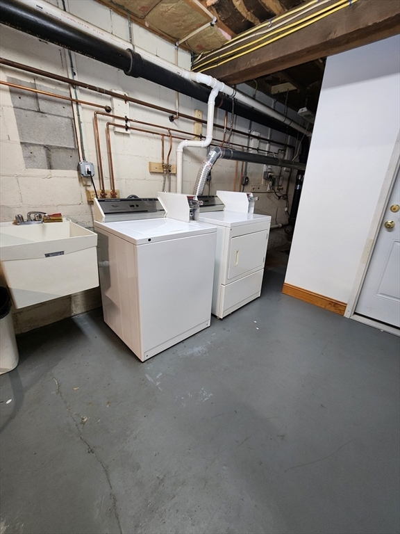 29 Sherman Street, Unit 1 Foxboro, MA 02035 - Photo 15 of 16 a utility room with dryer and washer