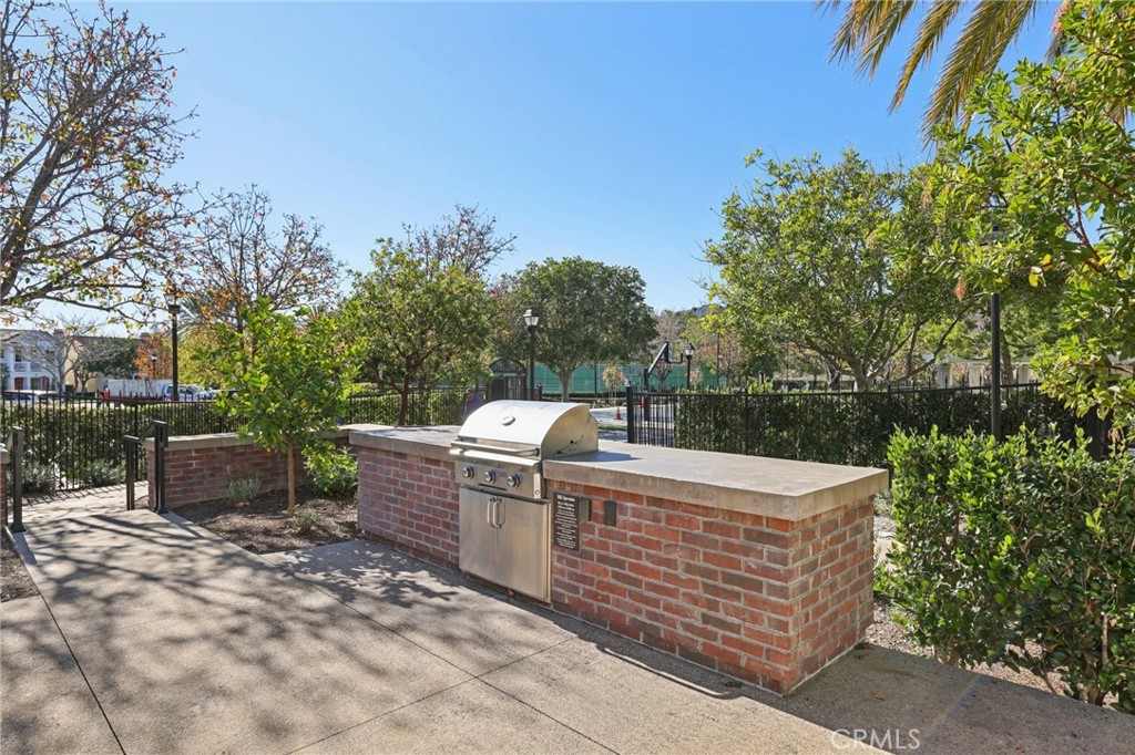 15 Whitworth Street Ladera Ranch, CA 92694 - Photo 35 of 57 a view of a backyard with sitting area