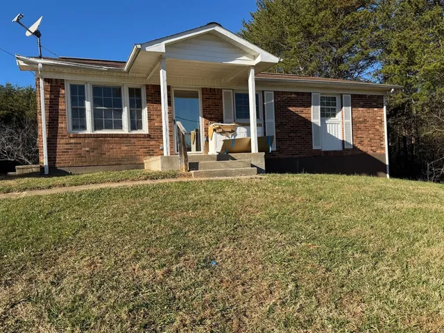 a front view of house with yard
