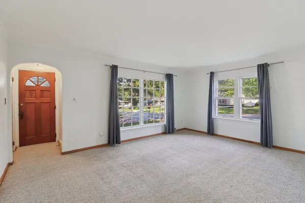 an empty room with windows