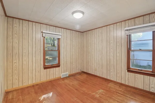 an empty room with windows