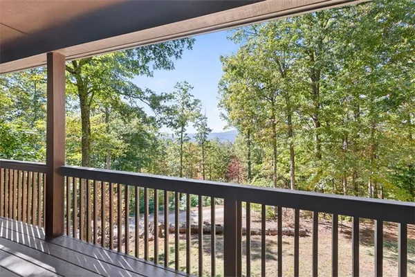 a view of a garden from a balcony