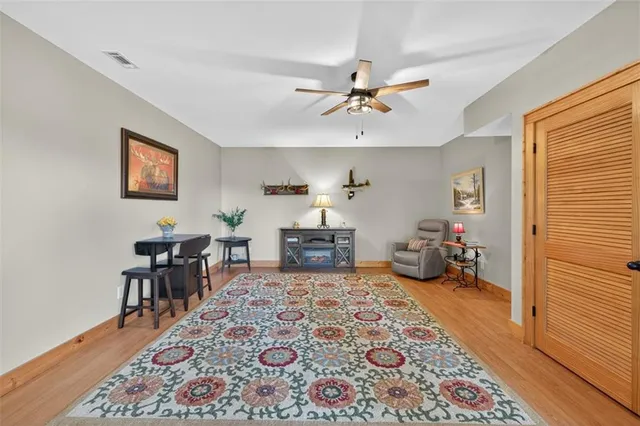 a view of a chair and table in the patio
