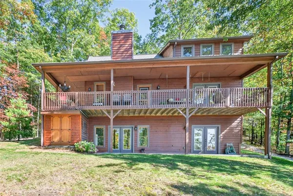 a kitchen with stainless steel appliances granite countertop a stove sink and cabinets