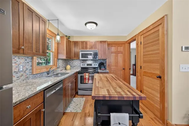 a view of a house with a street