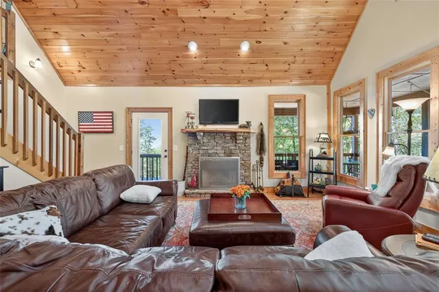 a living room with furniture or fireplace and a flat screen tv