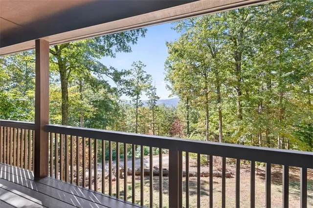 a view of a garden from a balcony
