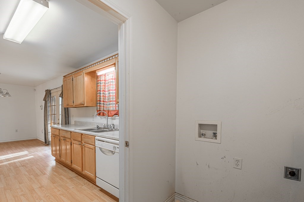 111 Hemlock Road Lufkin, TX 75901 - Photo 18 of 41 a kitchen with stainless steel appliances granite countertop a stove and a refrigerator
