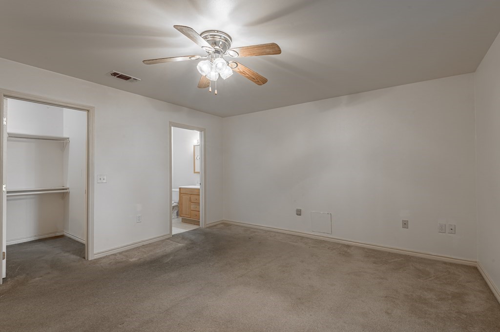 111 Hemlock Road Lufkin, TX 75901 - Photo 20 of 41 an empty room with chandelier fan