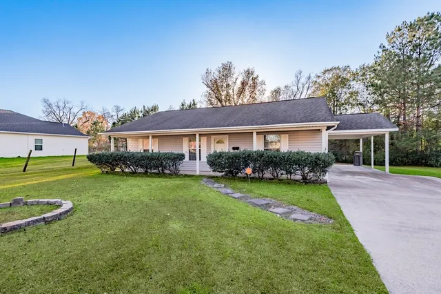 a front view of a house with a garage