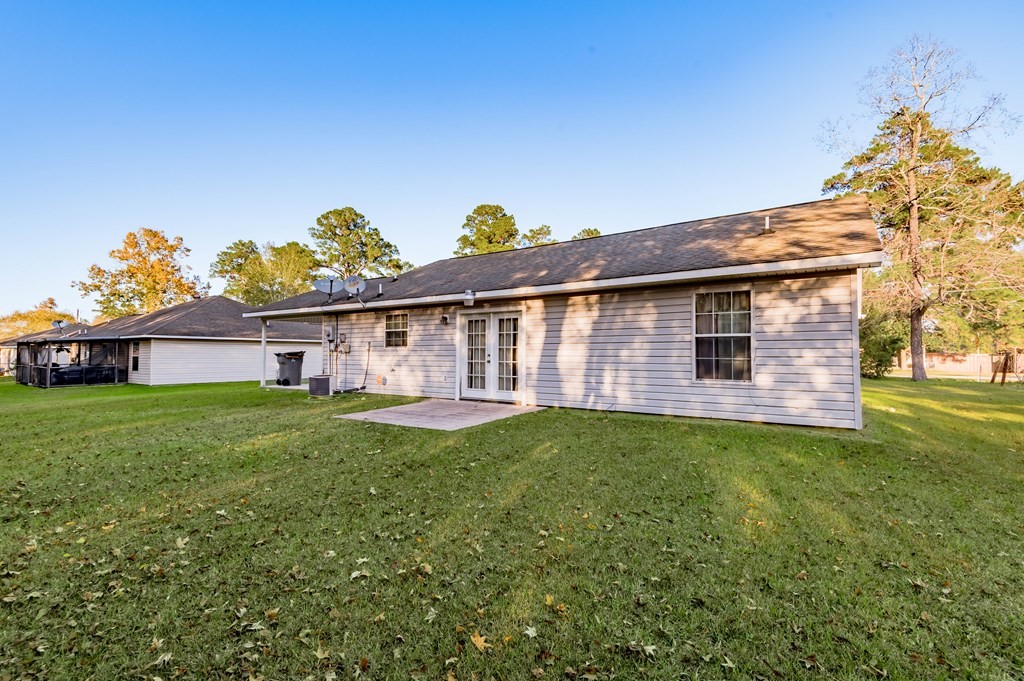 111 Hemlock Road Lufkin, TX 75901 - Photo 36 of 41 a view of a house with a backyard