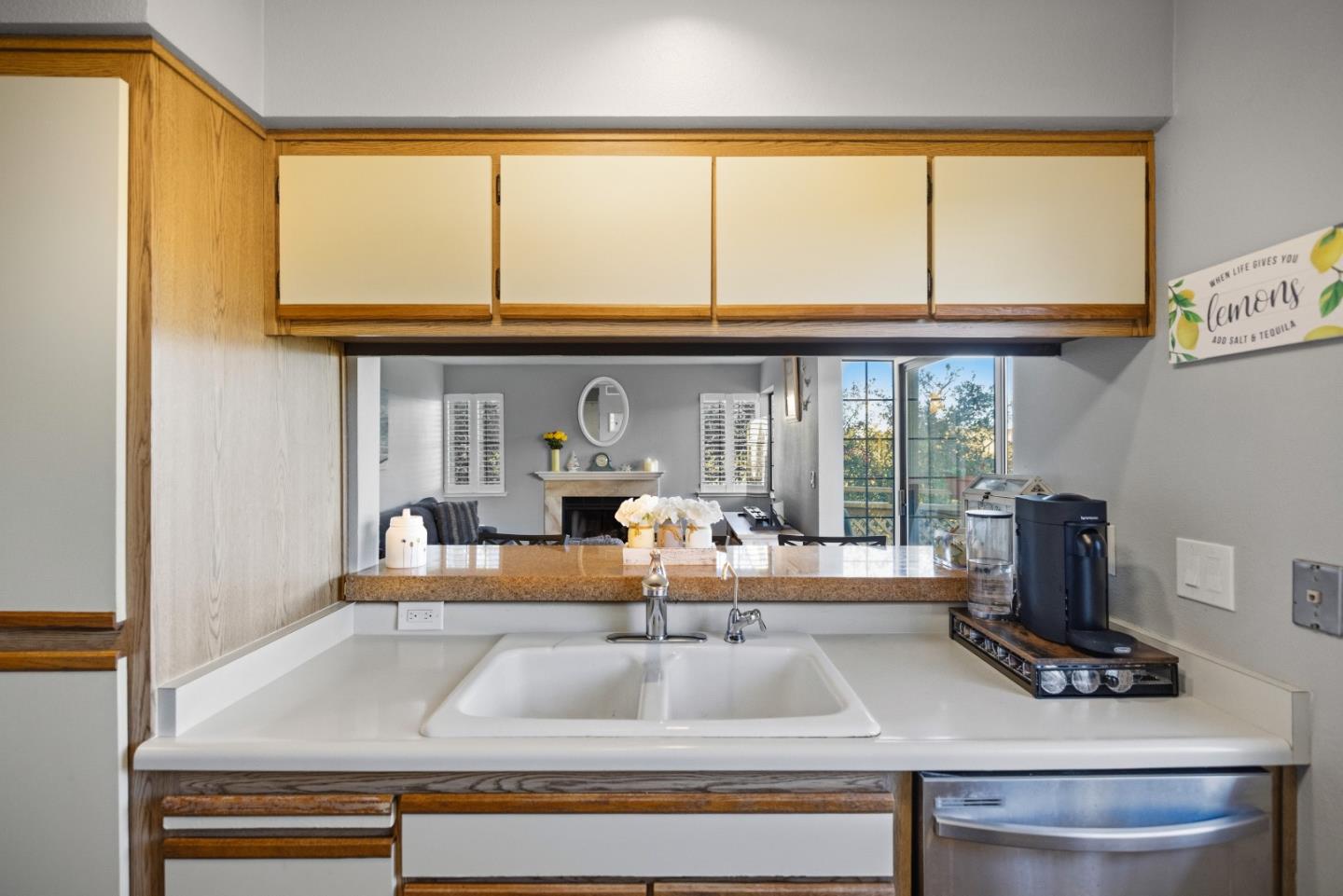521 Quail Run Court Del Rey Oaks, CA 93940 - Photo 12 of 31 a view of living room with furniture and large windows