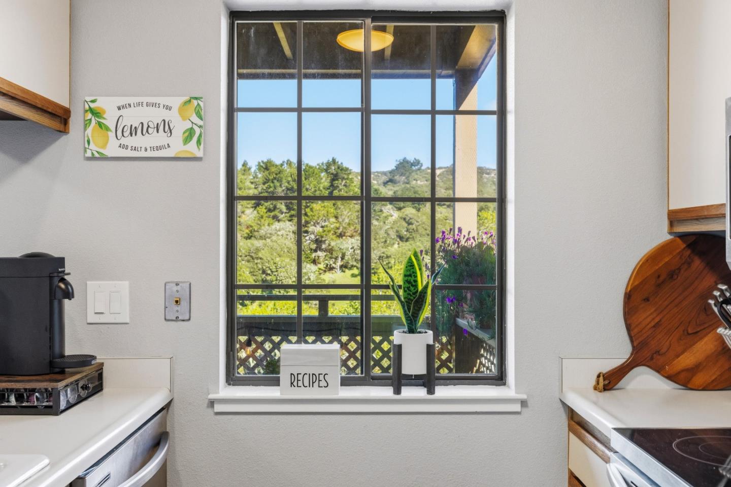 521 Quail Run Court Del Rey Oaks, CA 93940 - Photo 16 of 31 a room with a window and a flat screen tv