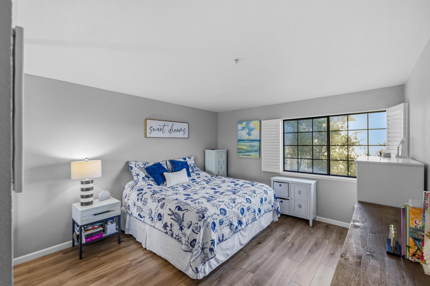 521 Quail Run Court Del Rey Oaks, CA 93940 - Photo 17 of 31 a bedroom with a bed and a window