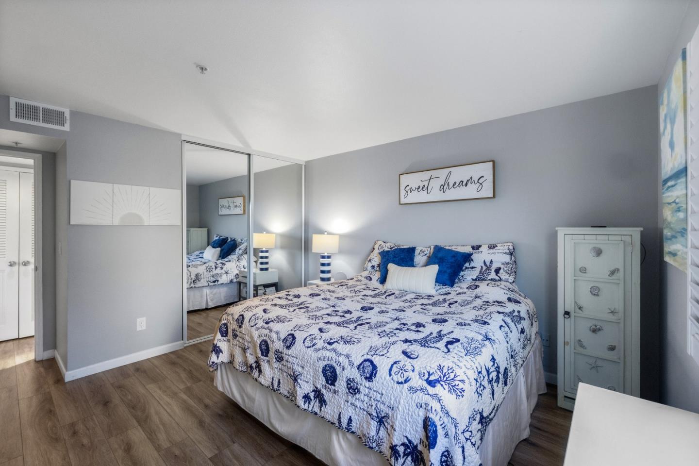 521 Quail Run Court Del Rey Oaks, CA 93940 - Photo 18 of 31 a bedroom with a bed and a painting