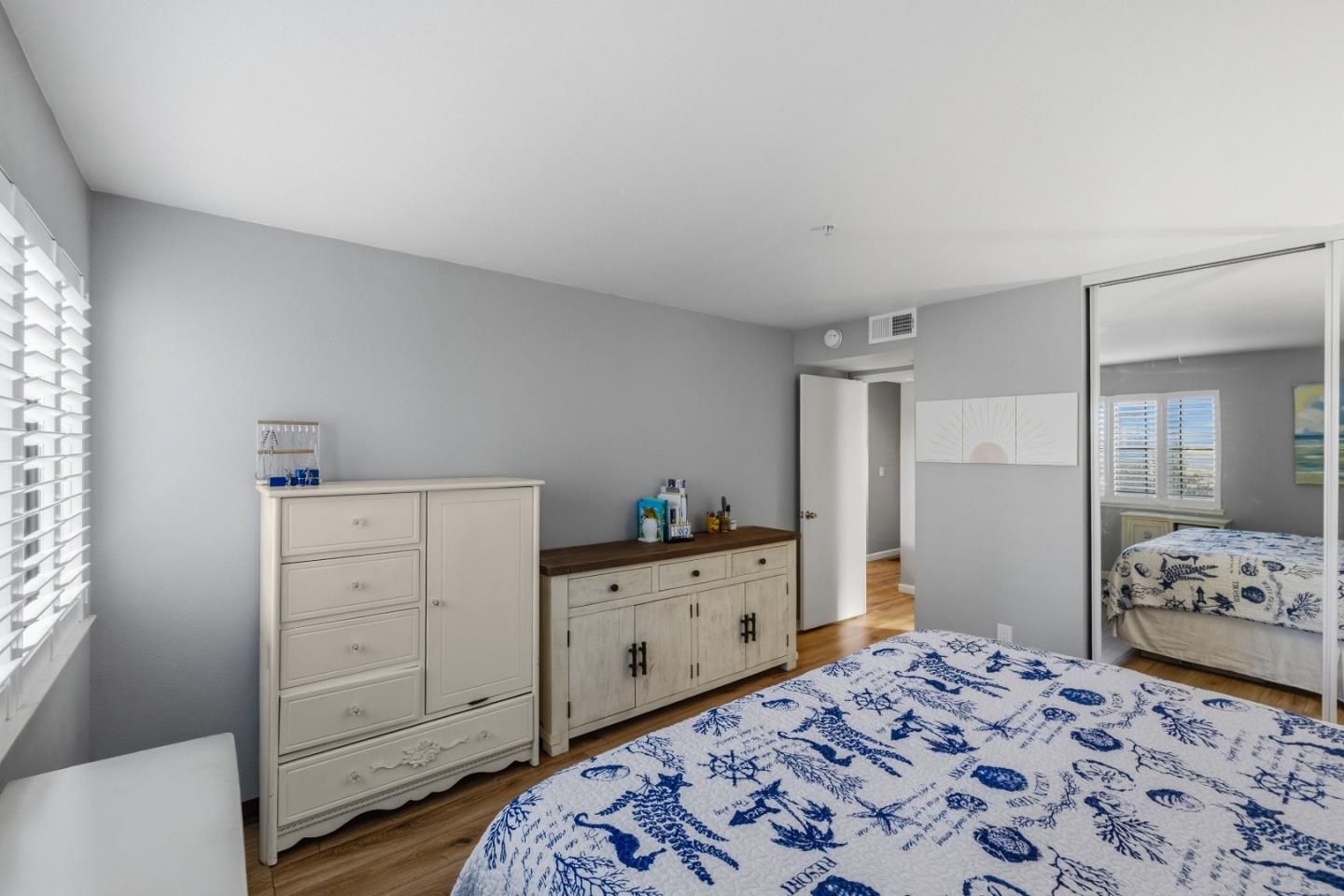 521 Quail Run Court Del Rey Oaks, CA 93940 - Photo 19 of 31 a bedroom with a bed and a dresser