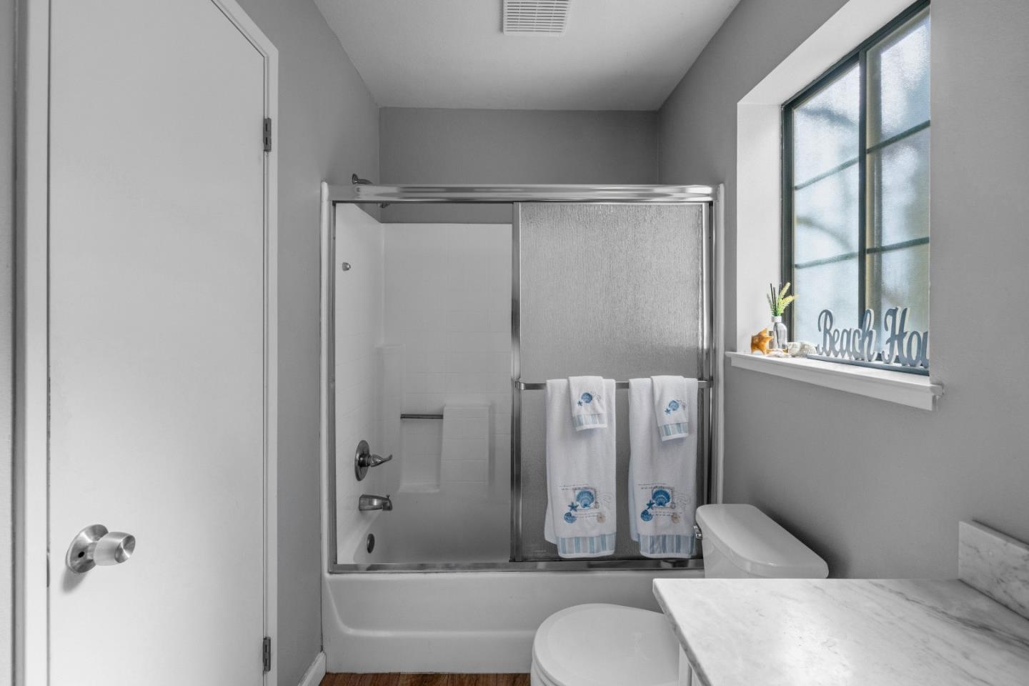 521 Quail Run Court Del Rey Oaks, CA 93940 - Photo 21 of 31 a bathroom with a granite countertop bathtub shower sink vanity and toilet